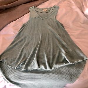 Green shirt shirt in front long in back!